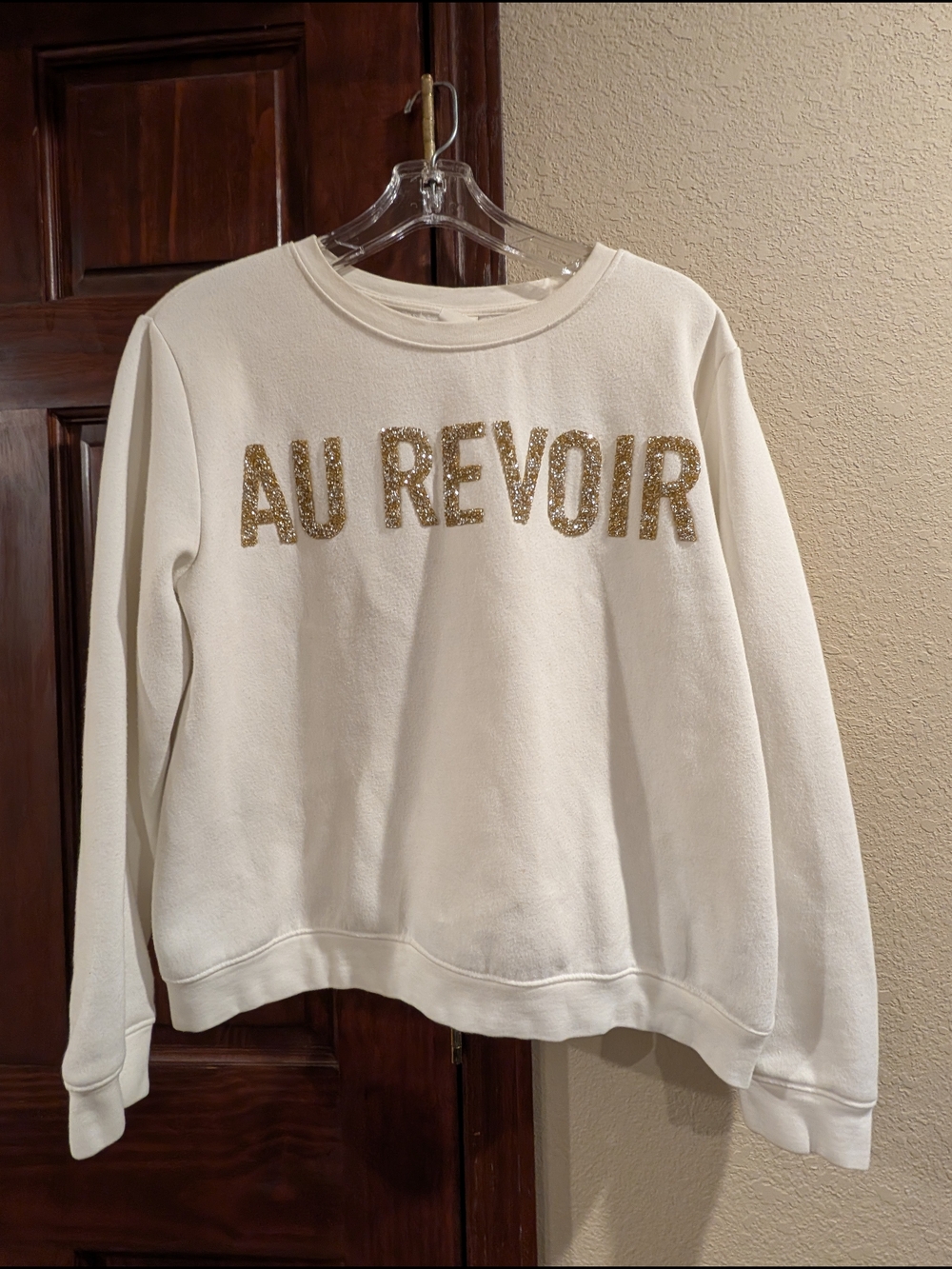 H&M Cream Sweatshirt with Gold Glitter 'AU REVOIR' Lettering